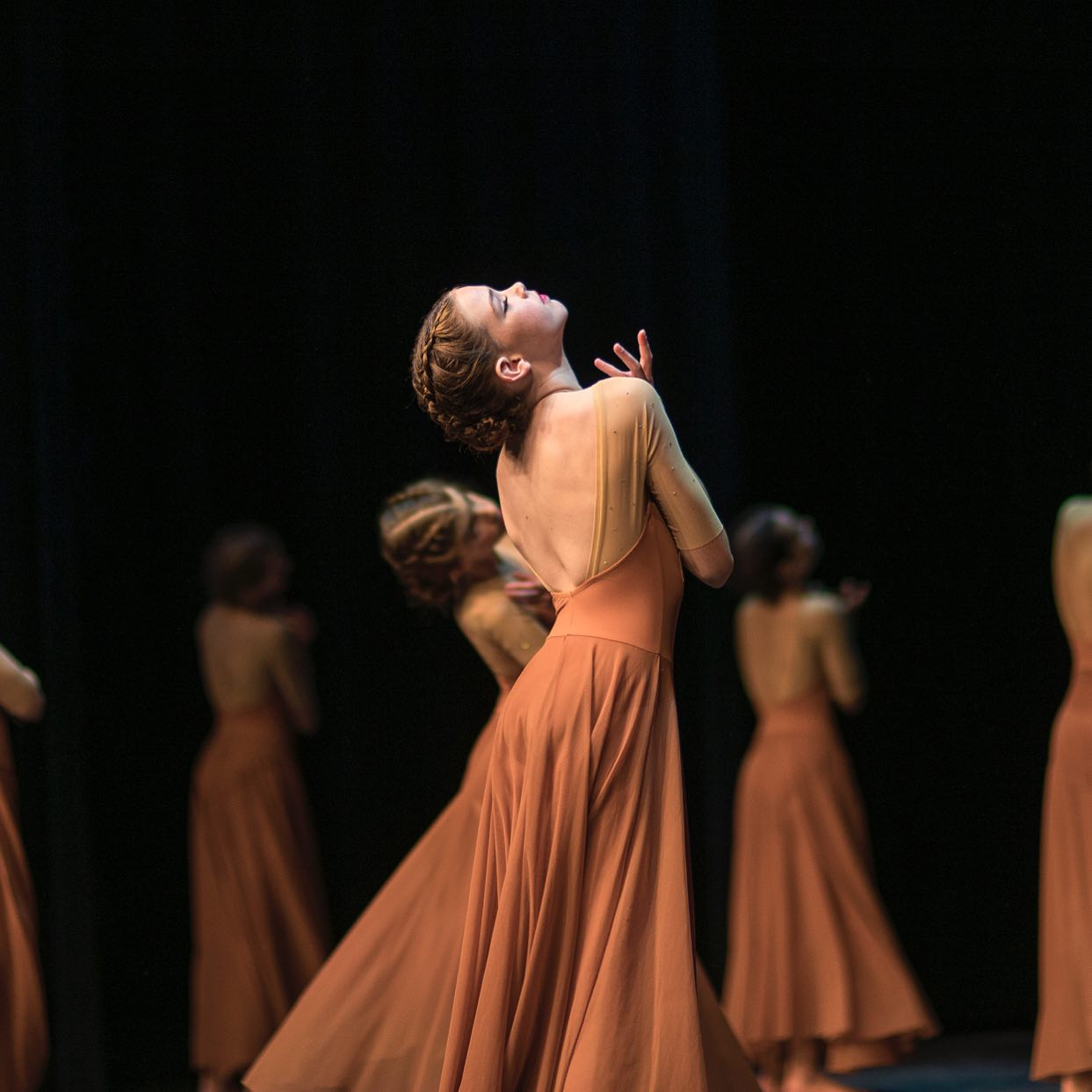 Members of the Design Dance Studio Teen Company of Traverse City, Michigan perform at their annual spring performance Bloom. Photo by Michael Poehlman.