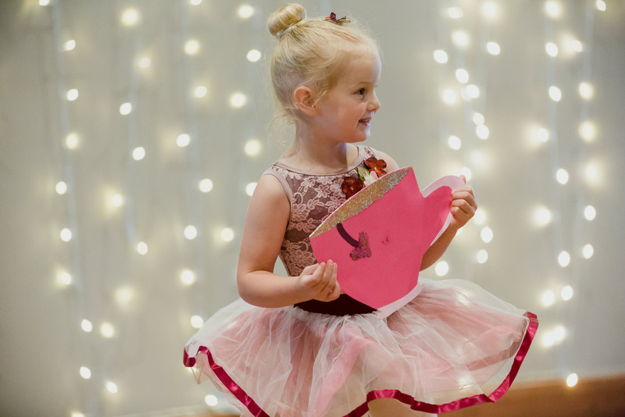 A young member of Design Dance Studio's Baby Bee program during their annual recital celebrating all they've learned in recreational kids dance classes in Traverse City, Michigan.